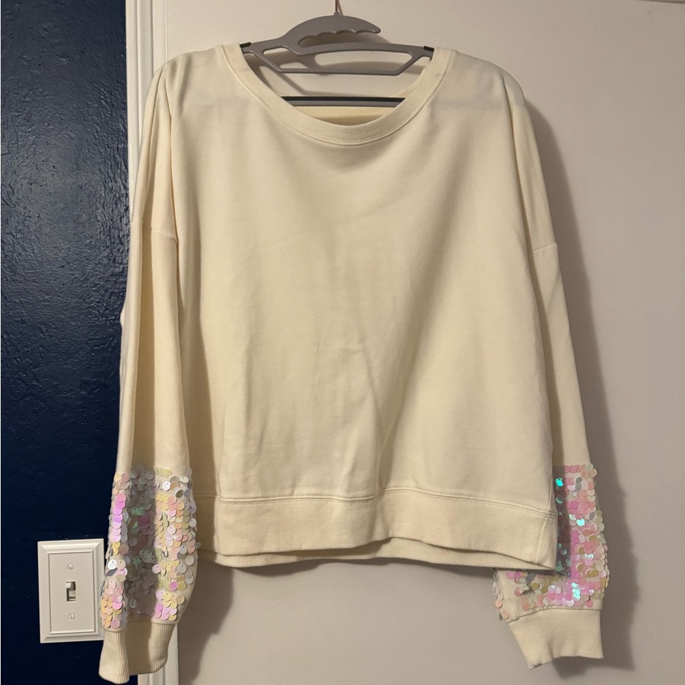 Girls off-white sweater w/sequins. Girls size Large (12-14)